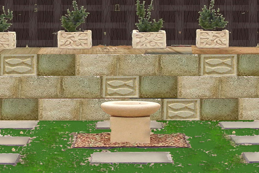 a photo of the very first garden area Mandy has been hard landscaping with the pots and blocks that she sculpts