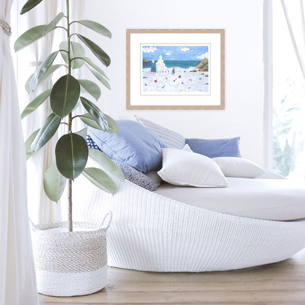 The limited edition print At the Beach in situ in a white light beach themed decore