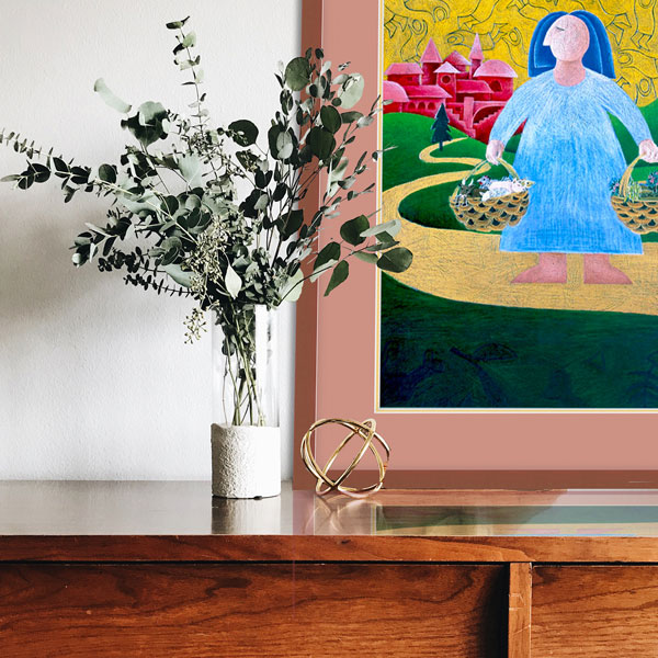 the framed print of going shopping in a darker, more natural wood theme - and there are some natural earthy green leaved plants in a vase on a dark grained buffet
