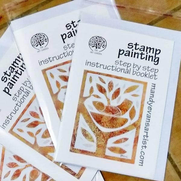 a shot of the stamp painting workshop booklets