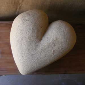 a sculpted cement love heart made by Mandy Evans Artist